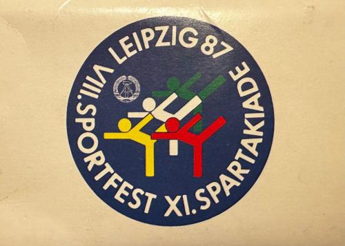 1987-logo-of-the-VIII.-Sport-festival-in-Leipzig-and-XI.-DDR-Olympiade-all-over-the-DDR