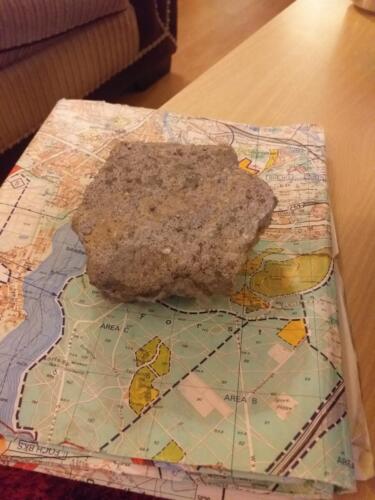 Berlin Wall fragment and military map