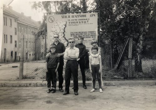 Linda, Sue, their father and another family in Poland.